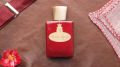 Roberto Ugolini 4 Rosso Fragrance layflat on leather background with red decorations
