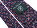 Back of Madder Print Silk Tie in Blue with Red and Buff Pattern Fort Belvedere