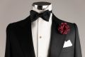 Burgundy Carnation Boutonniere Life Size Lapel Flower paired with Black Bow Tie and White Linen Pocket Square - all by Fort Belvedere