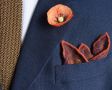 Folded Burnt Orange Silk-Wool Pocket Square with Paisley Motifs by Fort Belvedere