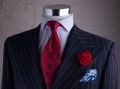 Red Rose on Chalk Stripe suit with light blue paisley silk pocket square & Jacquard Silk micropattern red tie