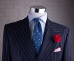 Red Rose Spray on Chalk Stripe with light pink linen pocket square and blue jacquard silk polka dot tie by Fort Belvedere