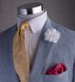 White Life Size Carnation, yellow striped tie and pink paisley pocket square by Fort Belvedere