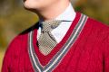 Houndstooth Bourette Silk Tie in Navy Blue and Beige in light blue long sleeve and red knitted sweater on top