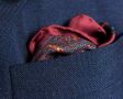 Close up Folded Burgundy Silk Pocket Square with little Paisley