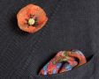 Folded Salmon Silk-Wool Pocket Square with Hunting Print Motifs and Orange Poppy Boutnniere
