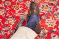 Chocolate Brown Gucci Loafer oaired with Over the Calf Silk Socks in Light Navy by Fort Belvedere on Persian rug