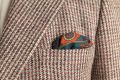 Sapphire Blue Pocket Square Art Deco Egyptian Scarab pattern in burnt orange, yellow, madder blue with teal contrast edge by Fort Belvedere - Puff fold