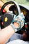 Driving Gloves in action in a Ferrari