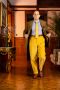 Raphael wearing the Goldenrod Yellow corduroy trousers. 
