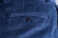 Close up view of the back pocket of the Infantry Blue Corduroy trousers. 
