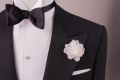 White Pocket Square and White Spray Carnation Boutonniere by Fort Belvedere in Dinner Jacket with Black Bow Tie