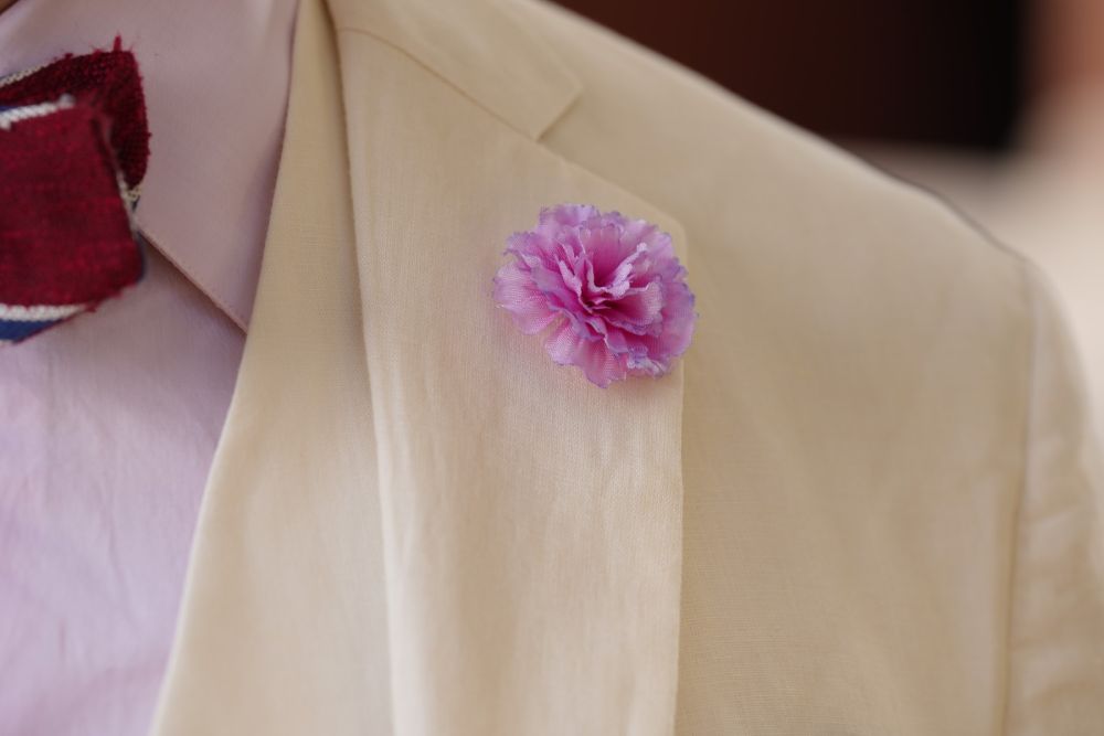 Mini Pink Carnation with purple pocket square and glen check silk bow tie - all by Fort Belvedere