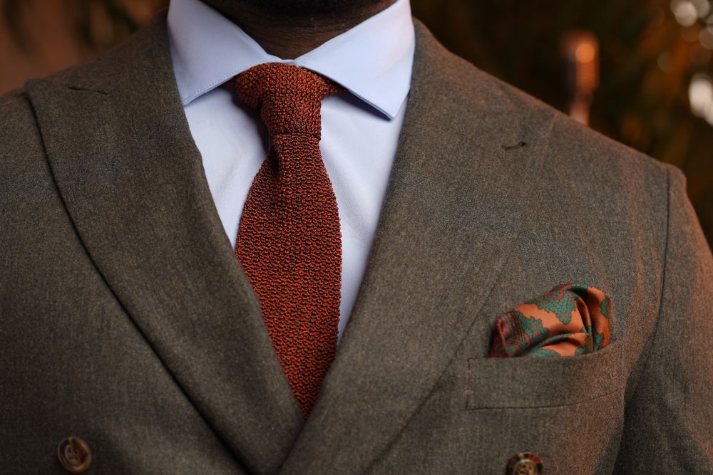 Real Ancient Madder Bronze, Burgundy and Bottle Green pocket square with orange-brown knit tie 