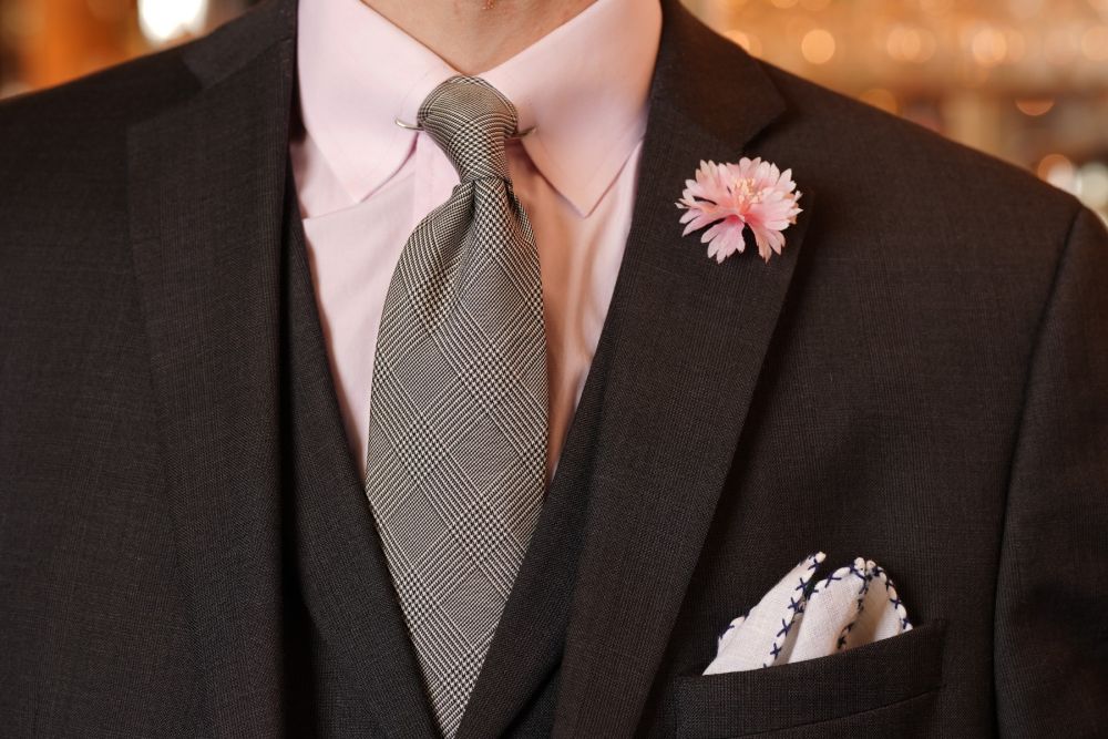 Pink Cornflower Boutonniere Buttonhole Flower Silk,whit linen pocket square  and Prince of Wales Check Silk Tie Dark Navy and White in dark suit