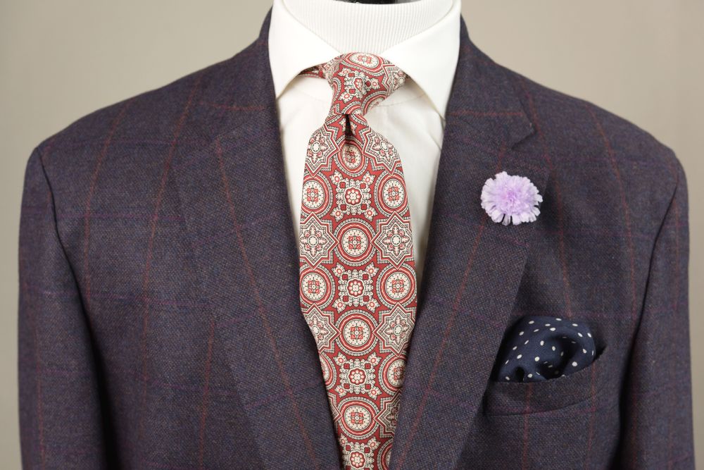 Ancient Madder Silk Tie in Red with Large Buff & Black Pattern ,Field Scabious Boutonniere & Navy Pocket Square with white polka dots - Fort Belvedere
