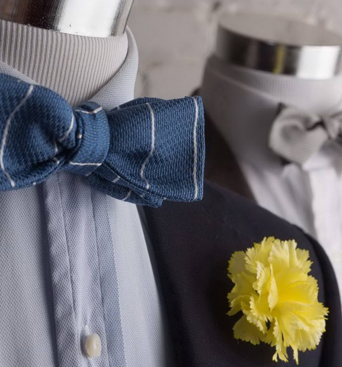 Blue striped jacquard bow tie and yellow carnation with blue blazer and light blue shirt - Fort Belvedere