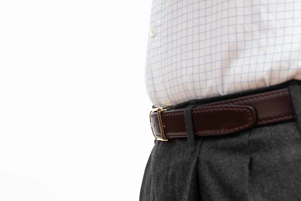 Burgundy belt lays nice and flat on the pants