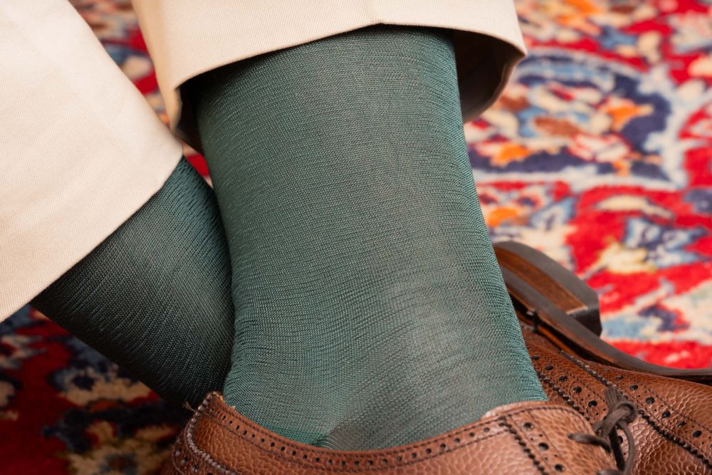 Close up of Fort Belvedere's Bottle Green Finest Silk Socks in the World, knitted in Italy with 280 needles 