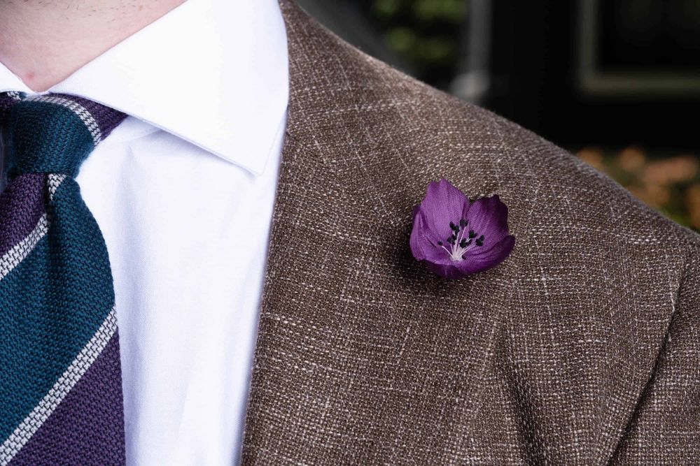 Violet and Black Christmas Rose Boutonniere Buttonhole Flower Fort Belvedere