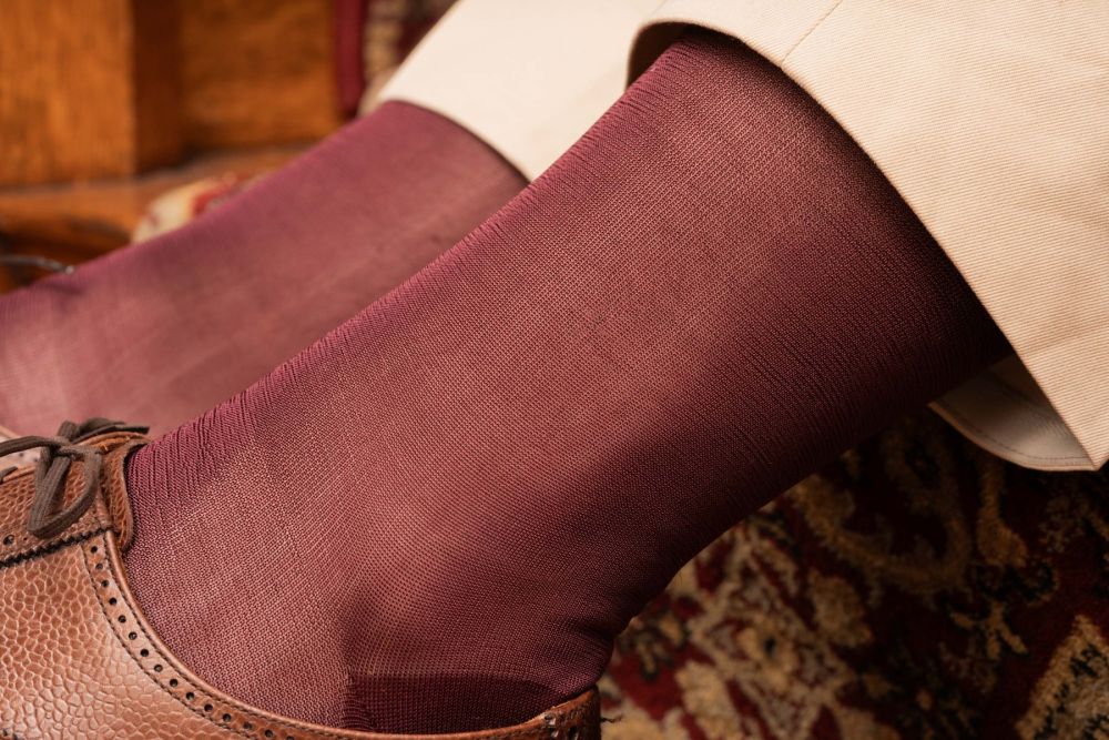 Upclose of 280 needles silk sock - Over The Calf in Burgundy Silk with Chinos and Brown Scotch grain brogues