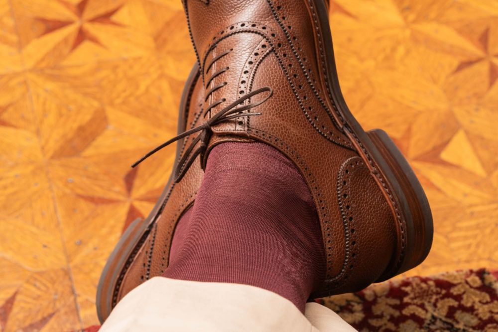 Detail of Finest Socks In The World - Over The Calf in Burgundy Silk with Chinos and Brown Scotch grain brogues