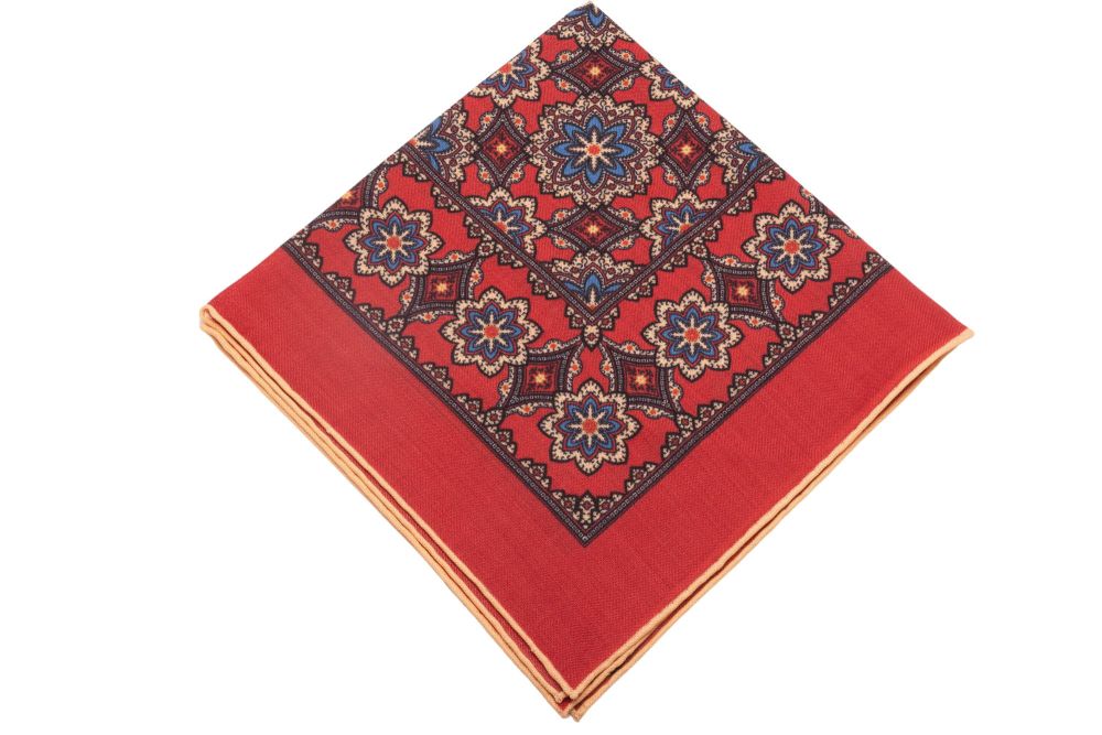 Cardinal Red Silk Wool Pocket Square with Printed geometric medallions in blue, black with buff contrast edge by Fort Belvedere