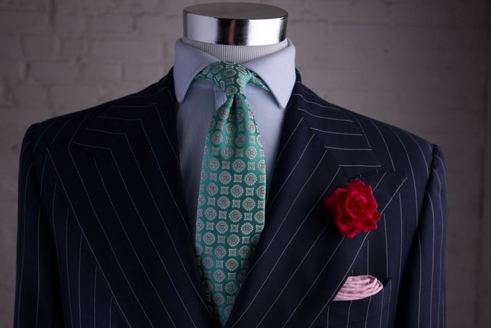 chalk stripe suit by ralph lauren purple label with red spray rose pocket square in light pink textured linen tie in green jacquard by fort belvedere 