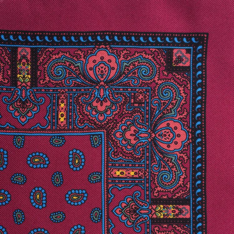 Close up of Burgundy Silk Pocket Square with little Paisley