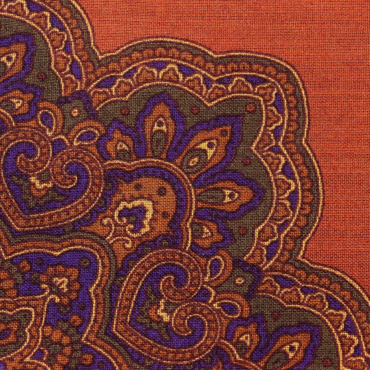 Close up of Burnt Orange Silk-Wool Pocket Square with Paisley Motifs