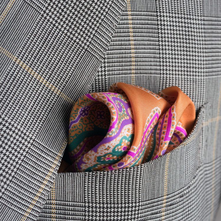 Folded silk pocket square in orange with Green, Pink & Purple Paisley by Fort Belvedere
