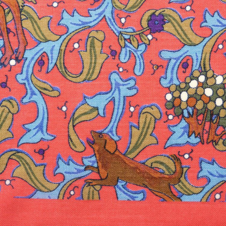 Close up of Salmon Silk-Wool Pocket Square with Hunting Print Motifs