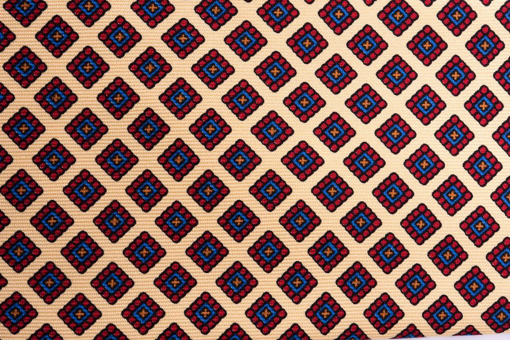 Close up Details Madder Print Silk Tie in Yellow with Red, Blue and Orange Diamond Pattern - Fort Belvedere