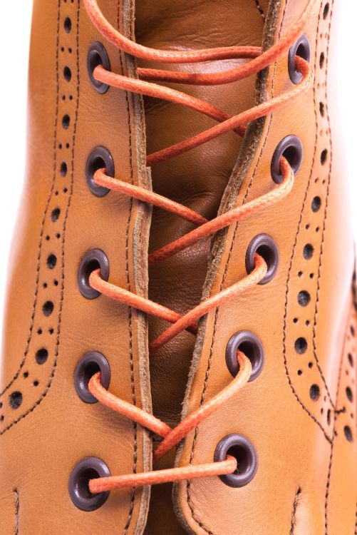 Close up shot of Orange Boot Laces Round Waxed Cotton by Fort Belvedere