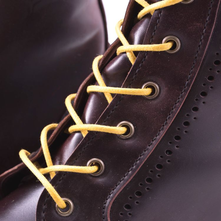 Close up shot of Yellow Boot Laces Round Waxed Cotton - by Fort Belvedere