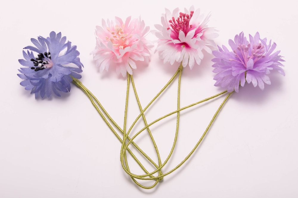 Collection of cornflower boutonnieres