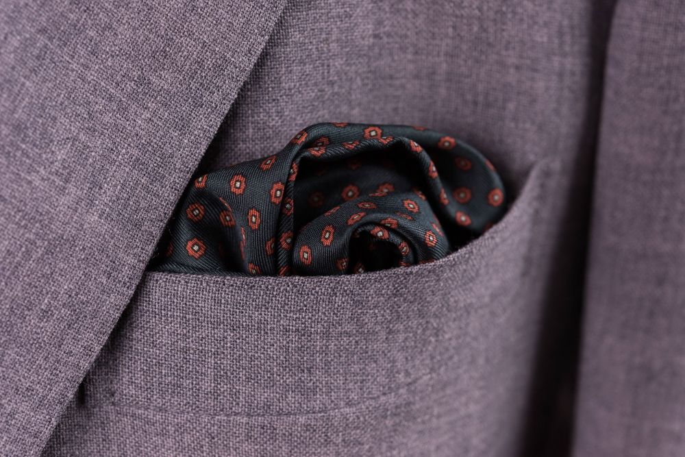 Dark Green Silk Pocket Square with Orange Dots and Light Blue Paisley Edge - Handmade in England by Fort Belvedere puff fold
