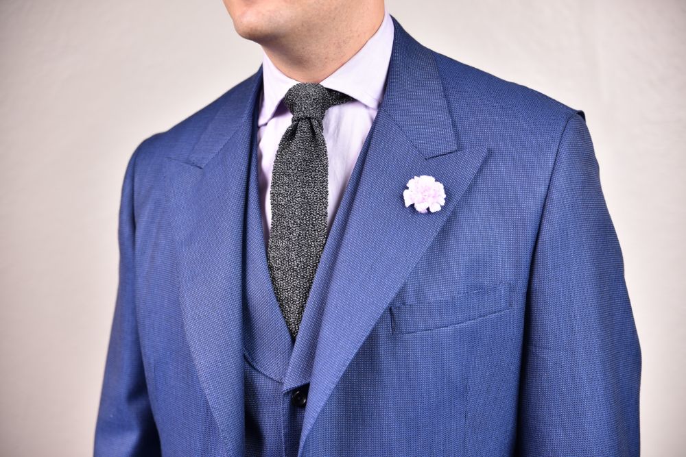 Grey Mottled Cri De La Soie Knit Tie by Fort Belvedere with blue suit and boutonniere