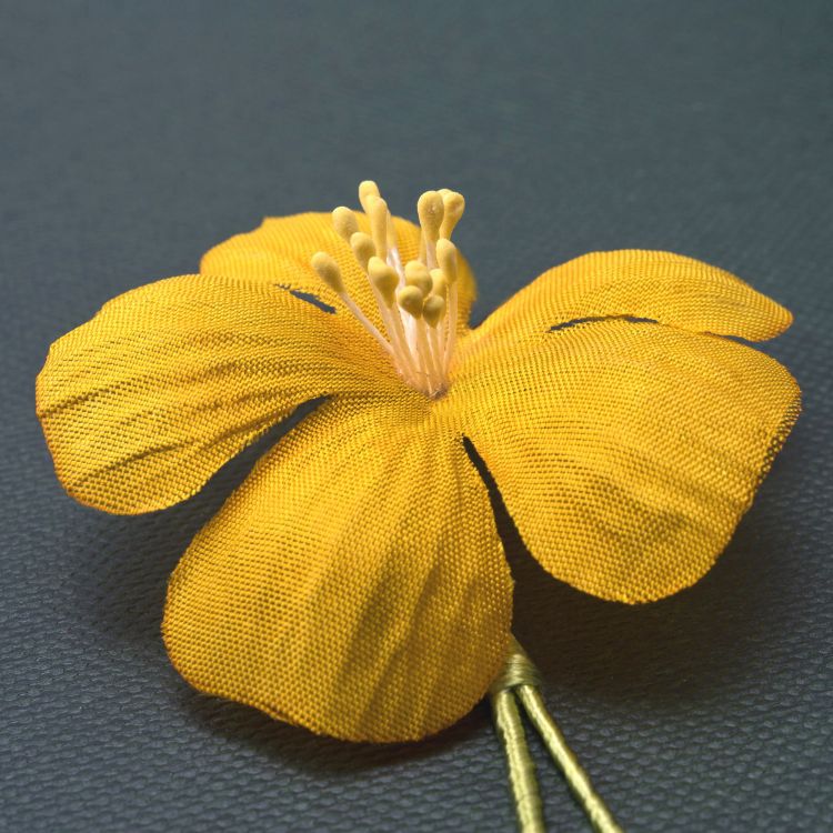 Detail shot of yellow exotic boutonniere