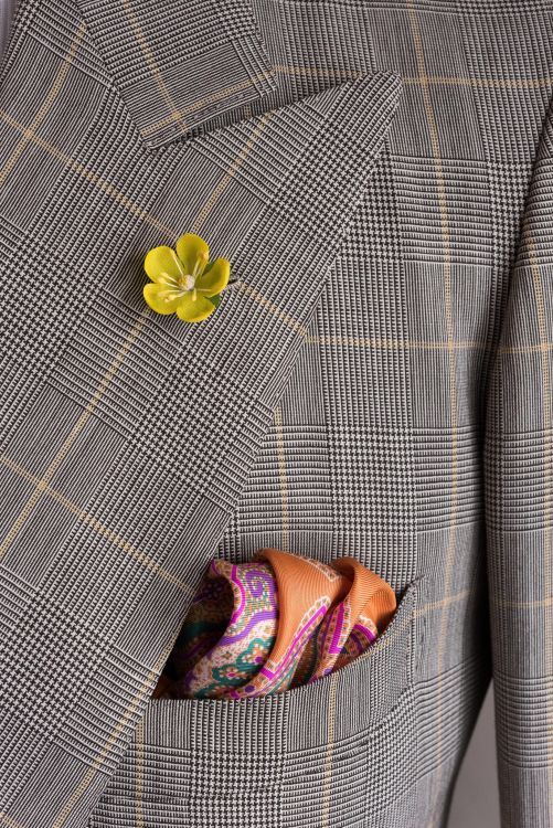 Yellow Mini Buttercup boutonniere with orange silk pocket square by Fort Belvedere