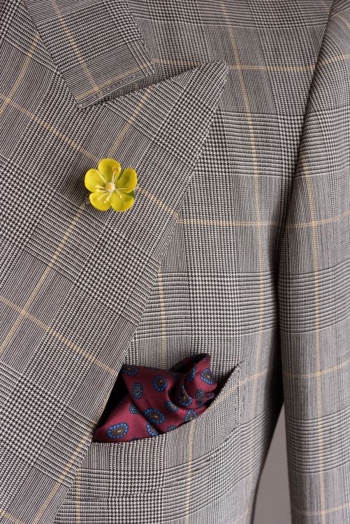 Buttercup boutonniere with burgundy paisley silk pocket square by Fort Belvedere