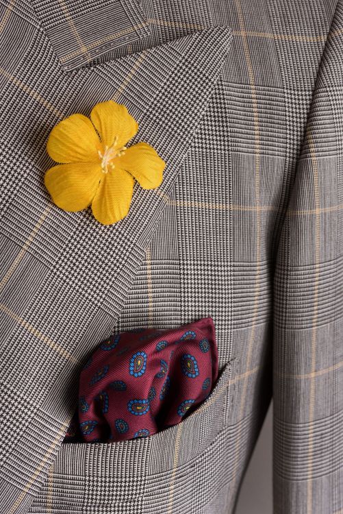 Yellow exotic boutonniere with burgundy paisley silk pocket square by Fort Belvedere