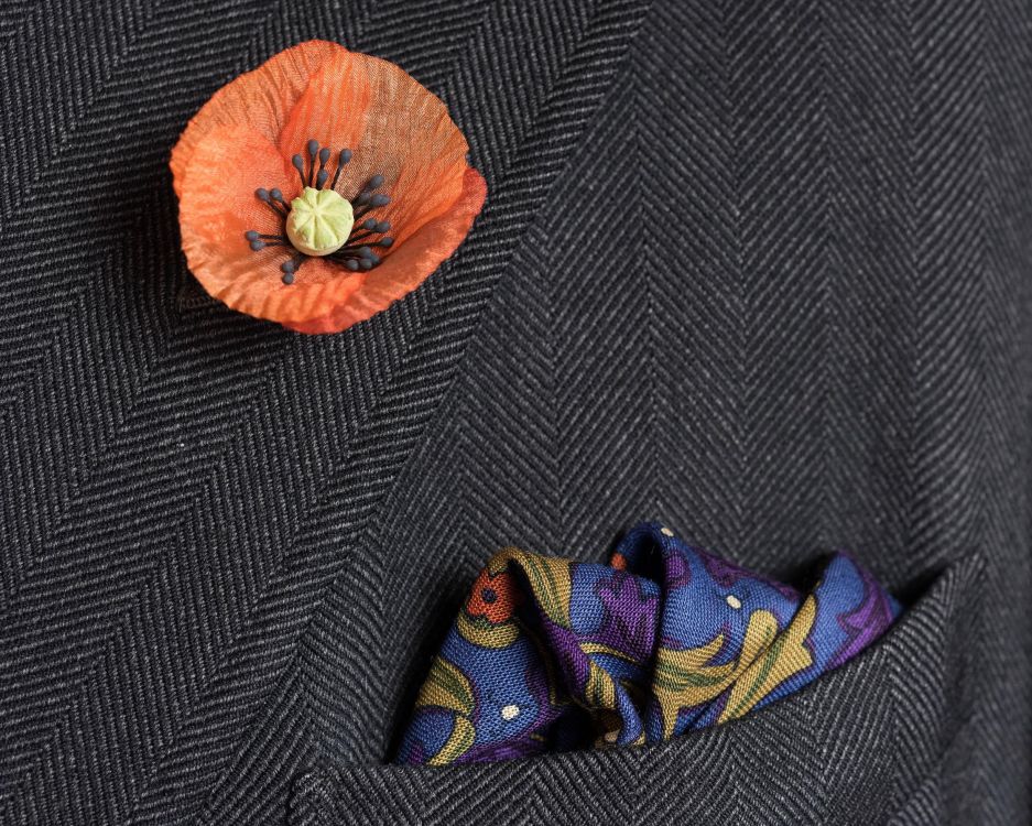Folded Mid Blue Silk-Wool Pocket Square with Hunting Motifs and Orange Poppy Boutonniere
