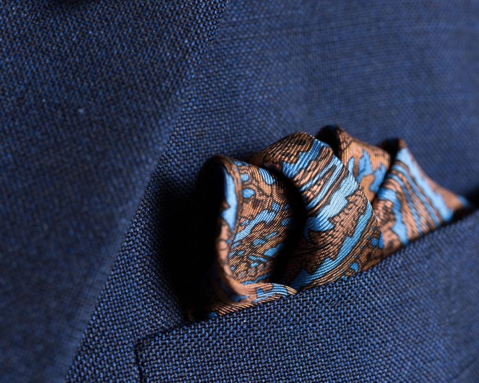 Folded Silk Pocket Square in Brown with Blue Paisley