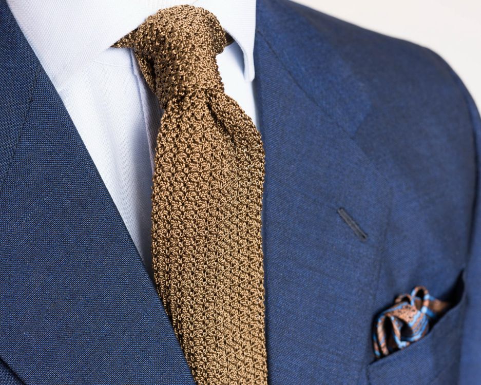 Folded Silk Pocket Square in Brown with Blue Paisley and Knit Tie in Solid Tobacco Brown Silk by Fort Belvedere
