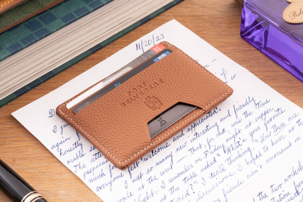 Golden Brown Togo Full-Grain Leather 4CC Wallet becomes more beautiful as they age.