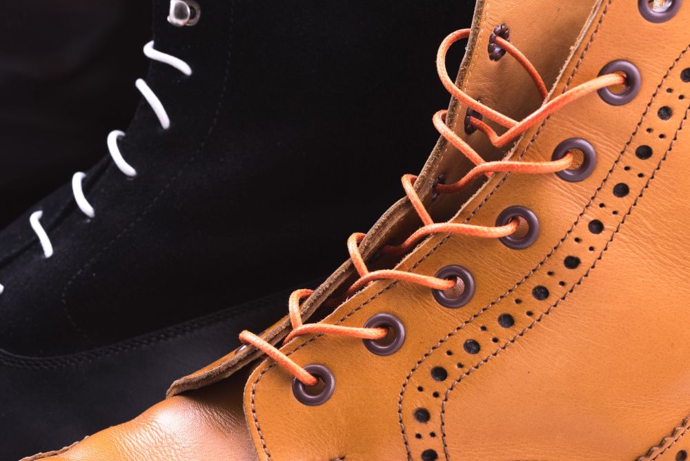 Side view Orange and White Round Boot laces made with high quality waxed cotton by Fort Belvedere