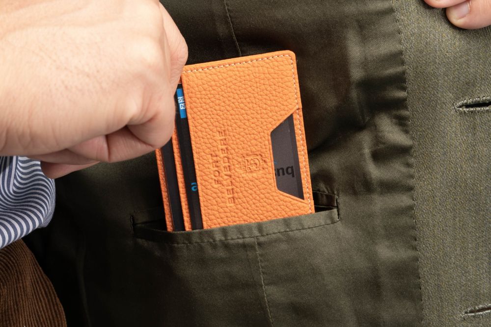 Orange Togo Full-Grain Leather 4CC Wallet has an ultra-slim profile.