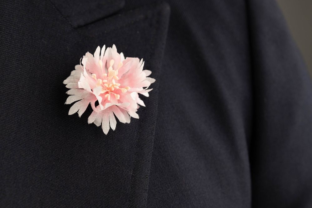 Pink Cornflower Boutonniere Buttonhole Flower Silk Fort Belvedere in dark suit