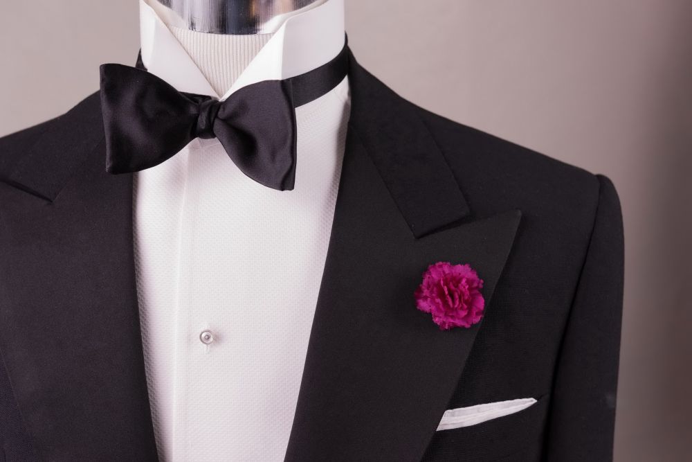 Purple Mini Carnation Boutonniere by Fort Belvedere with Tuxedo